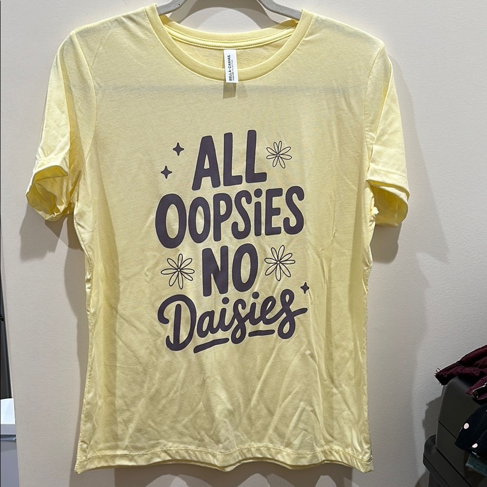 NWOT Bella Canvas “All Oopsies No Daisies” Soft Yellow Tee